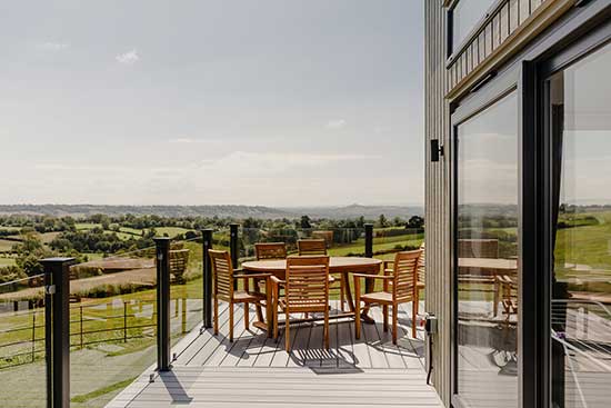 Exterior shot of Luxury Holiday Lodge with views of Glastonbury Tor